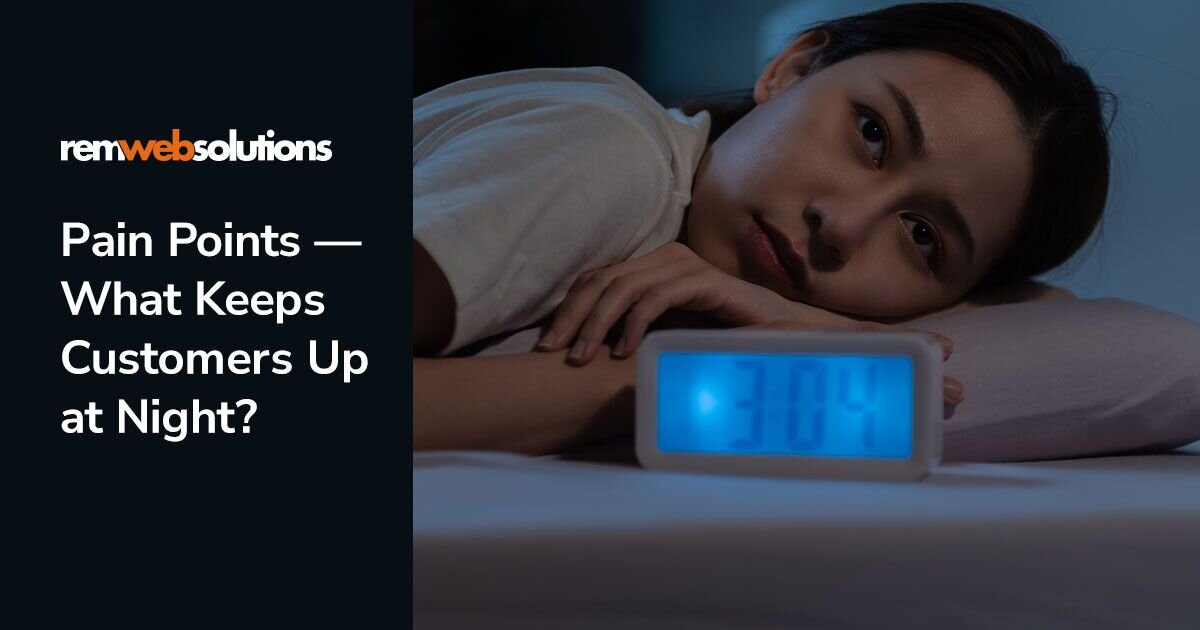 Woman laying on side in bed, alarm clock showing 3:00